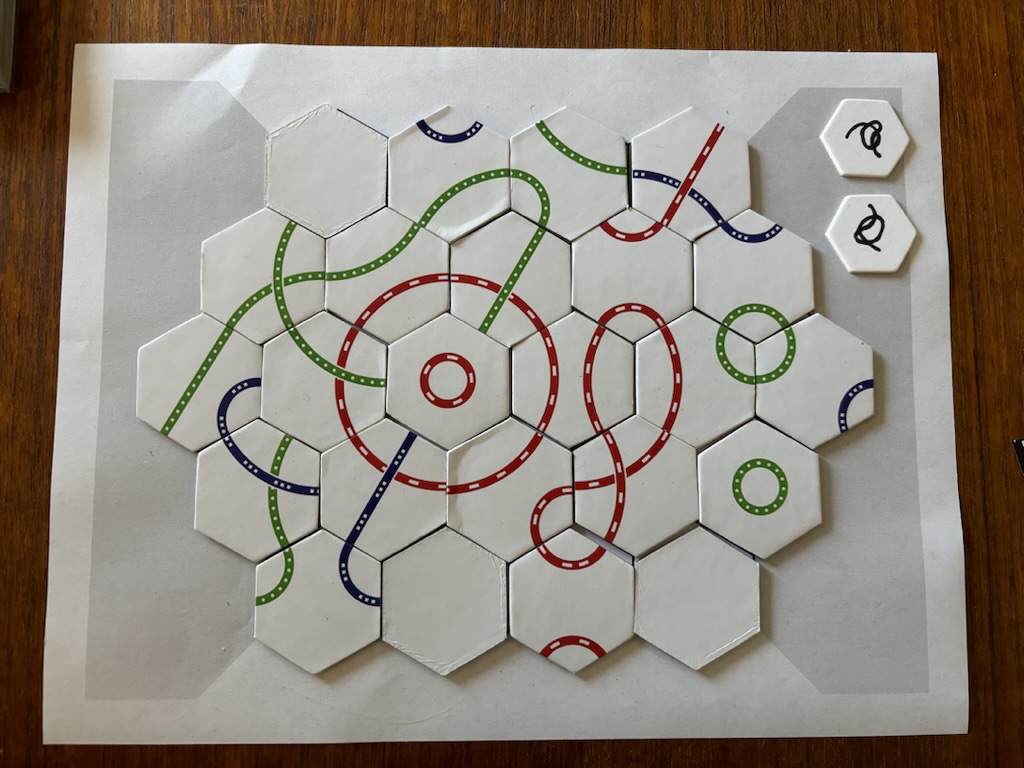 A completed Weft tableau with two tangle tokens